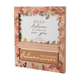 Rectangular MDF photo frame for 6x4in photos, brown wood-look finish with watercolour autumn leaves and red toadstools, tan panel reading "Autumn is my favourite season".