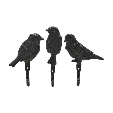 Set of 3 black cast iron wall hooks shaped as birds with detailed feathering, two in profile and one upright, each with a single hook below, on a white background.