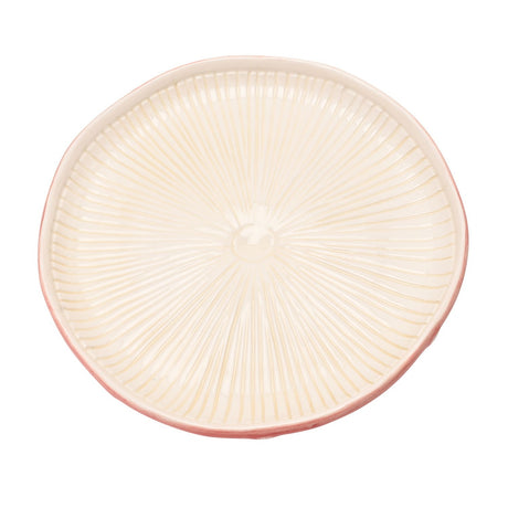 Round ceramic side plate with white ribbed toadstool-gill texture radiating from a centre dome, edged with a thin red rim, shown on a plain white background.
