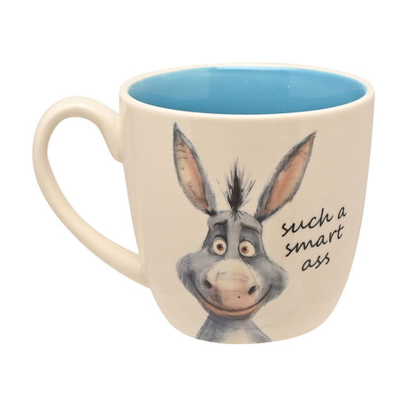 Cream earthenware mug with blue interior, featuring a grey cartoon donkey face and handwritten text "such a smart ass", shown on a plain white background.