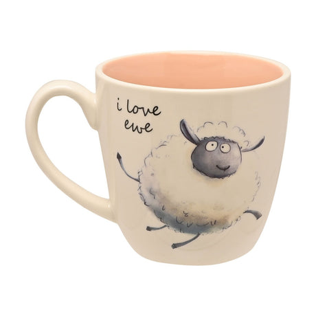 White ceramic mug with pink interior, featuring a hand-drawn skipping sheep illustration and "i love ewe" text in black script, set against a plain background.