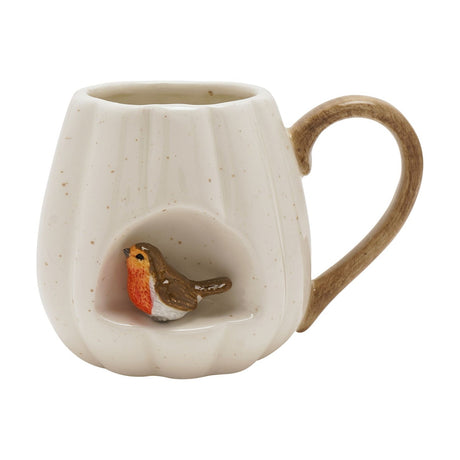 Speckled pumpkin-shaped ceramic mug in white with a ribbed body, brown handle, and a 3D robin figure nestled in an alcove on the front, shown on a plain white background.
