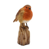 Resin robin figurine perched on a ridged tree trunk base, with brown feather detailing, orange breast, cream belly and dark eyes, shown on a plain white background.