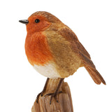 Robin Perched on a Trunk resin figurine with orange breast, brown feathered wings, cream belly and dark beak, standing on a ridged wooden trunk base against a white background.