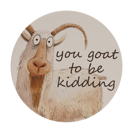 Round white ceramic coaster featuring a hand-drawn, wide-eyed goat with curly horns and a long beard, captioned "you goat to be kidding" in black script.