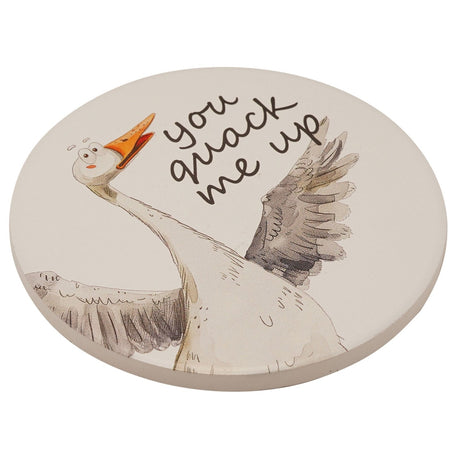 Round white ceramic coaster featuring a watercolour illustration of a duck with wings spread and beak open, alongside the handwritten text "you quack me up", on a plain white background.