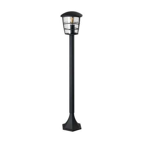 Clasvarne Bollard Light in black, a lantern-style post light with domed cap, slim cage bars and clear glass panels on a slender post with hexagonal base, shown on a white background.