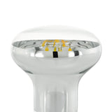 Close-up of a clear glass E14 R50 LED reflector bulb with silvered dome and visible filaments, shown on a plain white background.