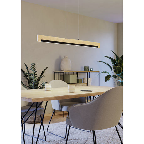 Clivane Pendant Light in black and brown, a long slim wood bar fixture with black inset strip, hung on two wires above a dining table in a neutral-toned room.