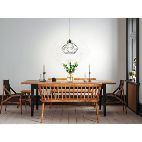 Clorbelle Smoked Glass Pendant Light 32.5cm in black, featuring a faceted wire cage over a tinted glass globe, hung above a wooden dining table in a living space.