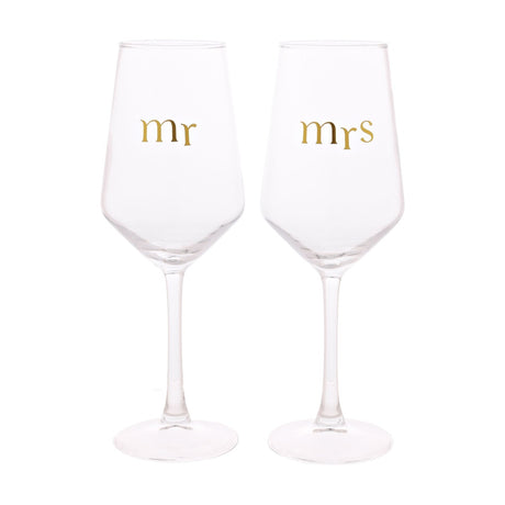 Set of two clear wine glasses with gold lower-case lettering reading "mr" and "mrs", each with a tall stem and round foot, shown on a plain white background.