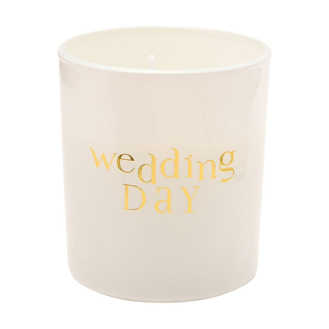 White round scented candle with glossy finish, featuring "wedding DAY" in gold lettering, single wick, 120g, shown on a plain white background.