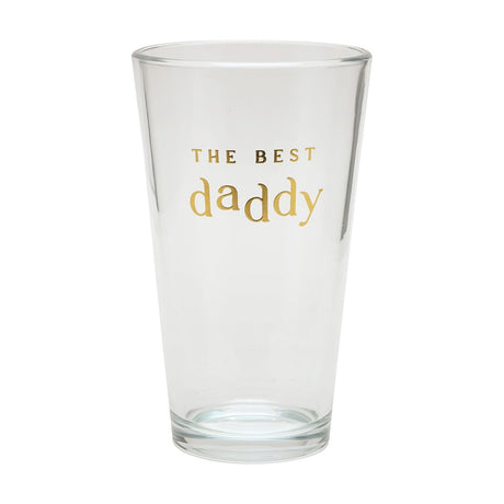 Clear glass tumbler with tapered shape and thick base, featuring "THE BEST daddy" in gold foil lettering, shown on a plain white background.