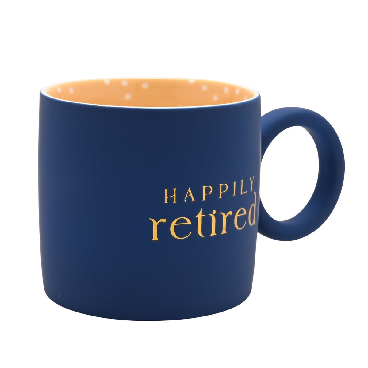 Matt porcelain mug in navy with "Happily retired" in gold lettering, a yellow interior dotted with white spots, and a round navy ring handle, shown on a white background.