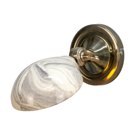Coco Ceramic Wall Light in marbled white and grey glaze, with a dome shade on a tiltable brass arm and round backplate, shown on a white background.