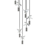 Comareira cascade pendant light with black nickel holders and faceted clear glass crossed drops on black cords, arranged in a spiral column against a plain white background.