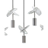 Comareira linear pendant light in black nickel, showing three drops with cylindrical shades and clear faceted glass leaf accents against a white background.