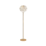 The Coniston 3 Light Crystal Floor Lamp in French Gold features a round base, slender stem, and a decorative shade with layered crystal-like petals—an elegant luxury lighting piece for any sophisticated space.