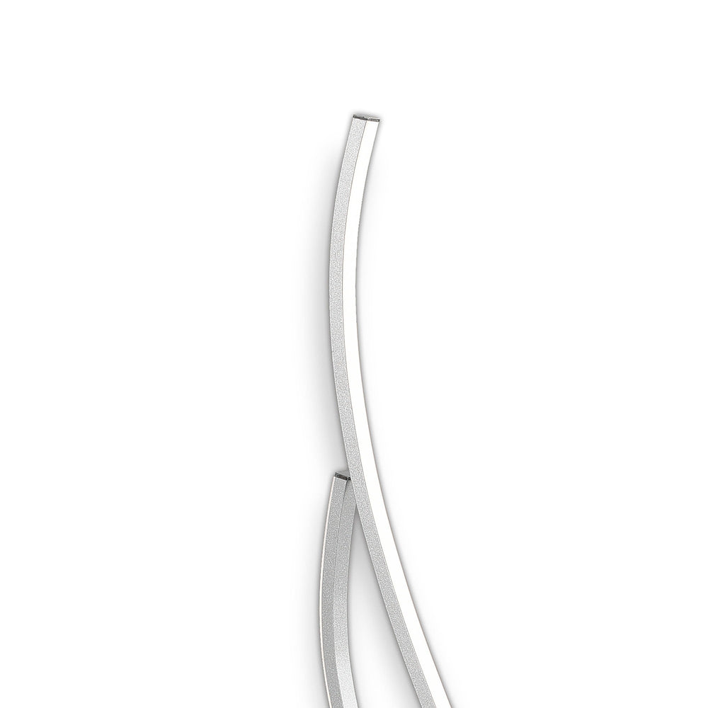 Corinto Large LED table lamp detail showing the polished chrome and silver curved aluminium arms against a plain white background.