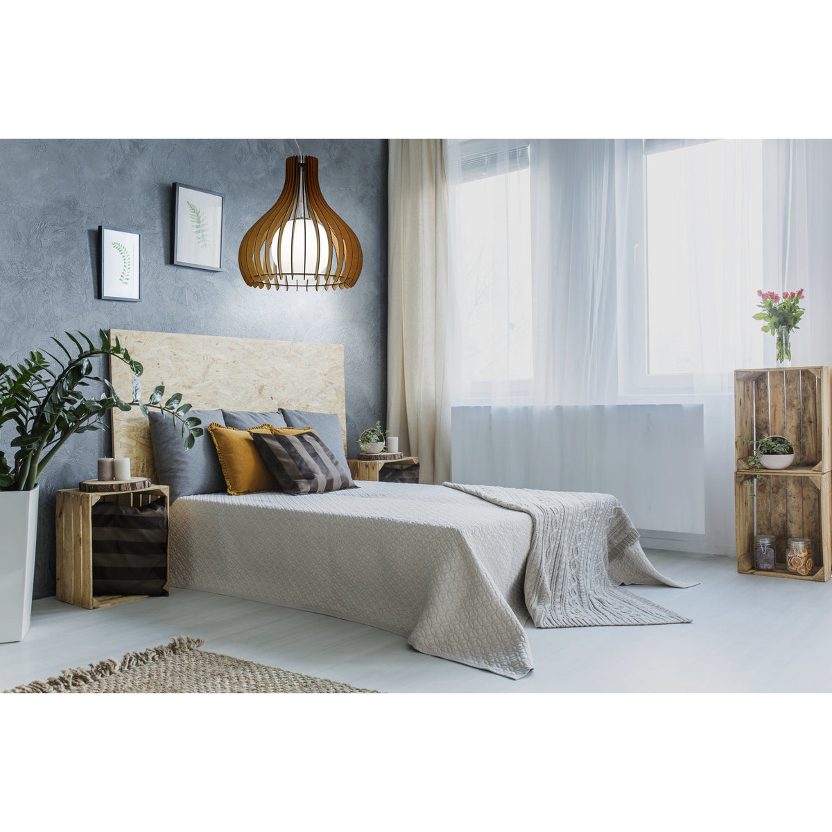 Cormarne Glass Pendant Light in warm maple wood with onion-shaped slatted cage and white glass globe, shown above a bed in a grey and neutral-toned bedroom.