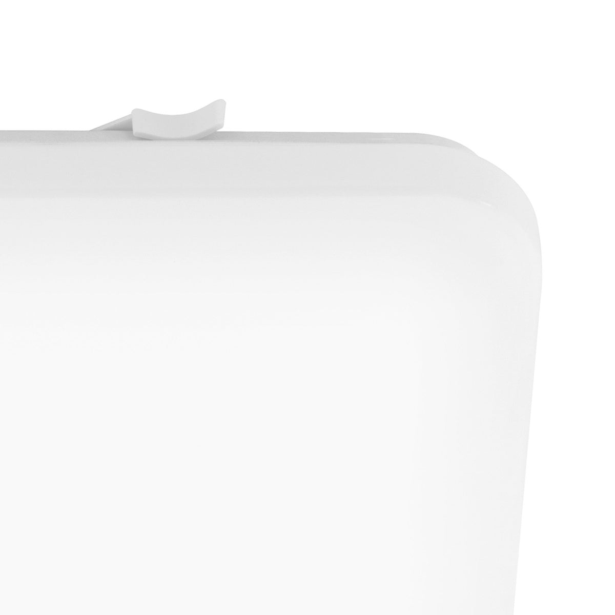 Close-up of the Crelvette LED bathroom ceiling light's rounded corner, showing the white opal diffuser, steel body, and side release clip on a plain white background.