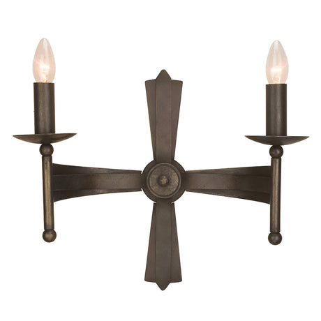 The Cromwell 2 Light Wall Light in Old Bronze is a wall-mounted, two-arm metal sconce expertly crafted from heavy iron. Its medieval-inspired design features a circular center, with each arm elegantly extending outward to hold light bulbs that mimic candle flames.