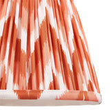 Endon Daneton 20cm tapered lamp shade in apricot orange and white zigzag pleated faux silk, close-up of the gathered lower edge with taped trim.