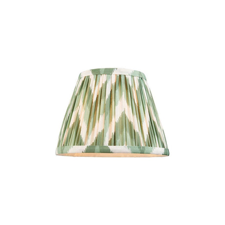 Endon Daneton 20cm tapered lamp shade in pleated faux silk with a green and cream zigzag print and taped edges, on a white background.