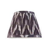 Endon Daneton 20cm tapered lamp shade in pleated pearl grey faux silk with a zigzag print and taped edging, shown on a plain white background.