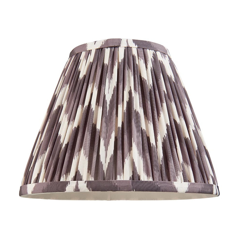 Endon Daneton 25cm tapered lamp shade in pleated faux silk with a pearl grey and white zigzag print, taped edges and gimbal fitting, on a white background.