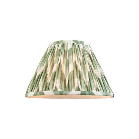 Endon Daneton 30cm tapered lamp shade in Cotswold green faux silk with pleated zigzag print and taped edging, on a plain white background.