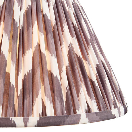 Close-up of Endon Daneton 30cm tapered lamp shade in pearl grey, showing pleated faux silk with a zigzag print and taped edge detailing.