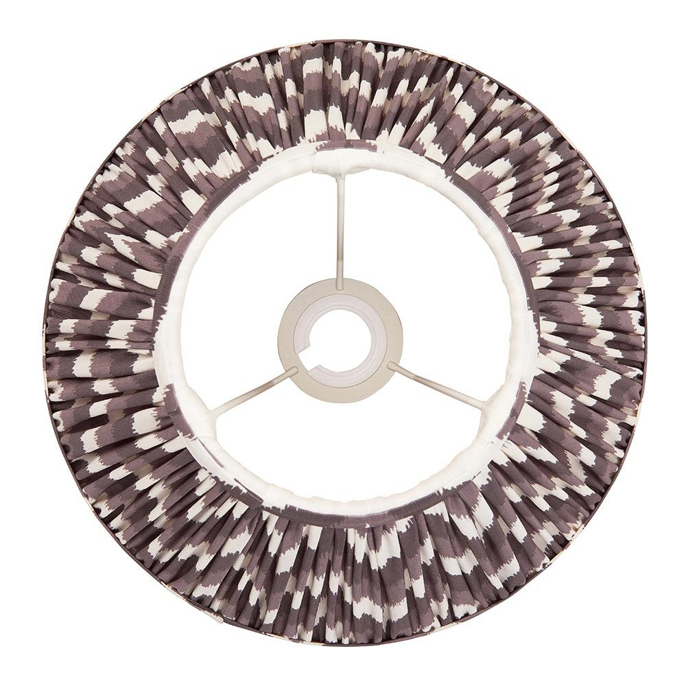 Endon Daneton 30cm tapered lamp shade in pearl grey pleated faux silk with zigzag print, taped edges and fixed gimbal fitting, viewed from above.