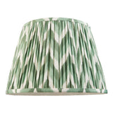 Endon Daneton 35cm tapered lamp shade in pleated faux silk with a green and white zigzag print and taped edging, on a plain white background.