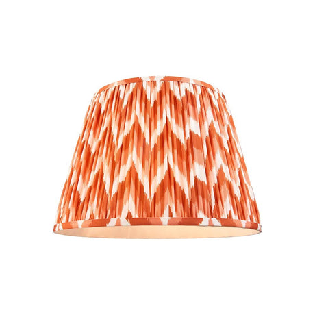 Endon Daneton 40cm tapered lamp shade in apricot orange and white zigzag pleated faux silk, shown on a plain white background.