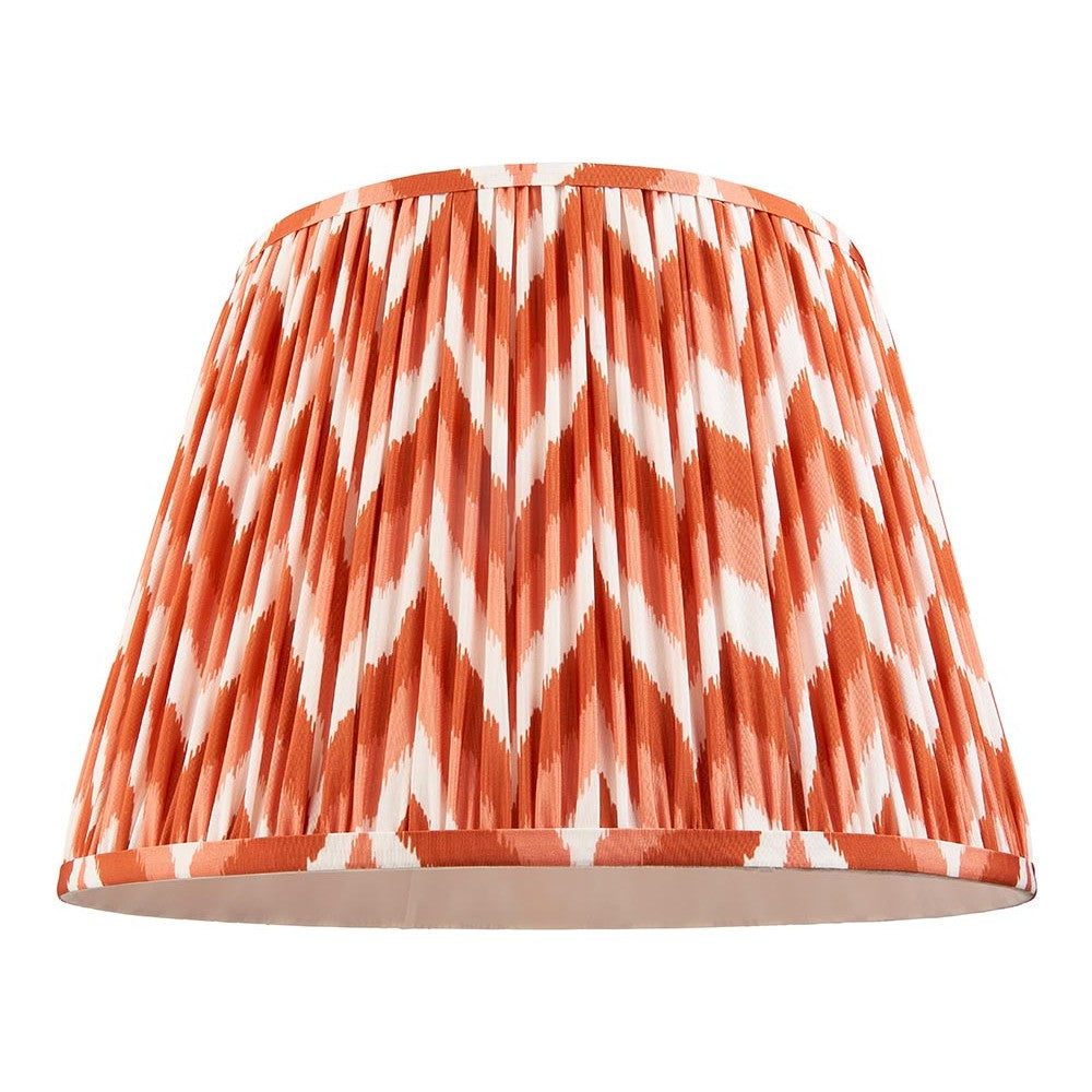 Endon Daneton 40cm tapered lamp shade in pleated faux silk with an apricot orange and white zigzag print, taped edges and plain inner lining.