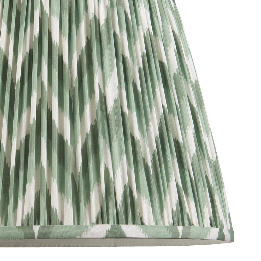 Endon Daneton 40cm tapered lamp shade in Cotswold green, close-up of pleated faux silk with zigzag print and taped edge detail.