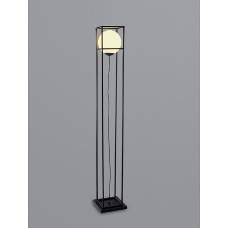 The Desigual Small 1 Light Floor Lamp in matt black features a modern square geometric frame with a glowing spherical bulb suspended at the center and a visible cord, all set against a plain gray background.