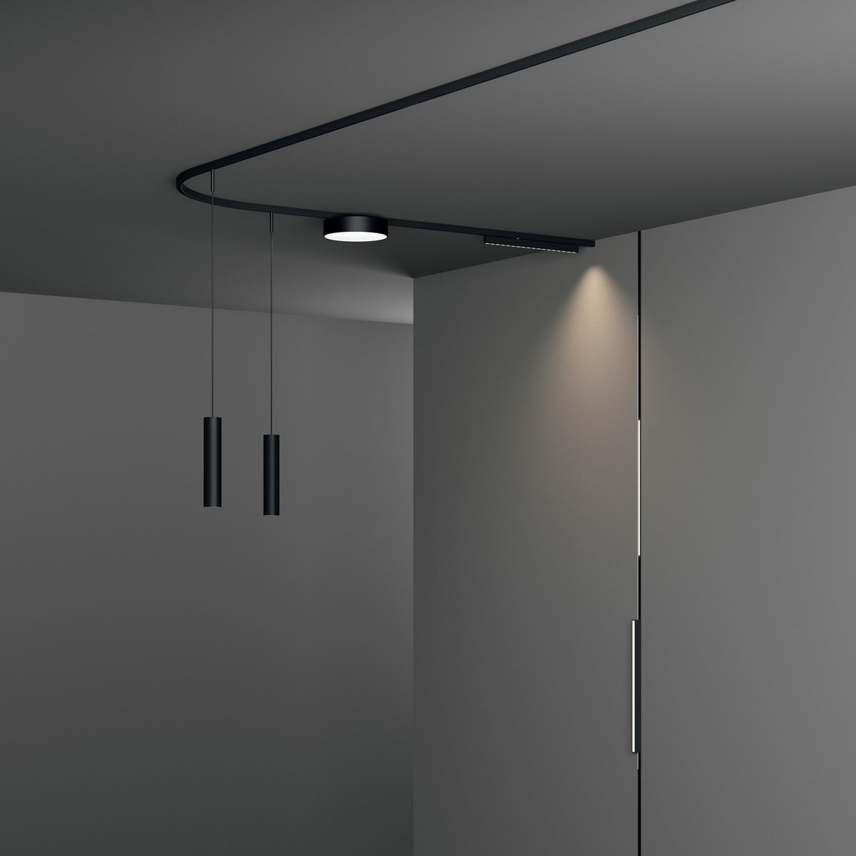 Deva 2m Surface 24V Lighting Track in black, shown curving along a grey ceiling with a round spotlight and two slim pendant lights suspended nearby.