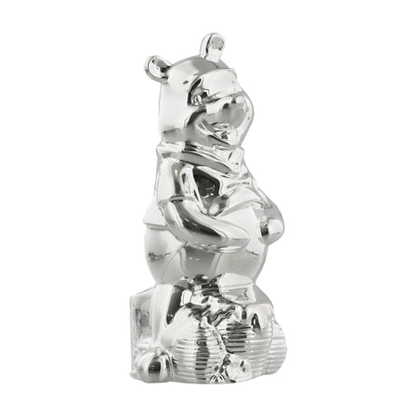 Standing Winnie the Pooh silverplated money box, mirror-finish figure with paws on tummy and rounded ears, on a plain white background.