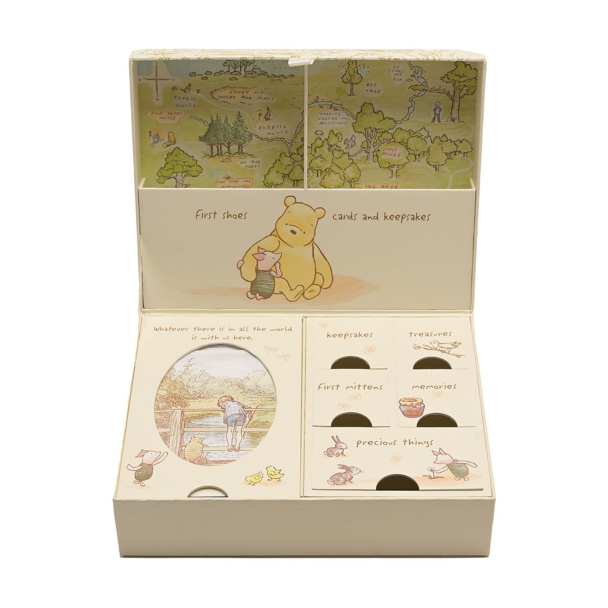 Cream rectangular Classic Pooh keepsake box, open to show printed meadow map lid, Pooh and Piglet illustration, and labelled compartments for first shoes, keepsakes, treasures, and mementos.