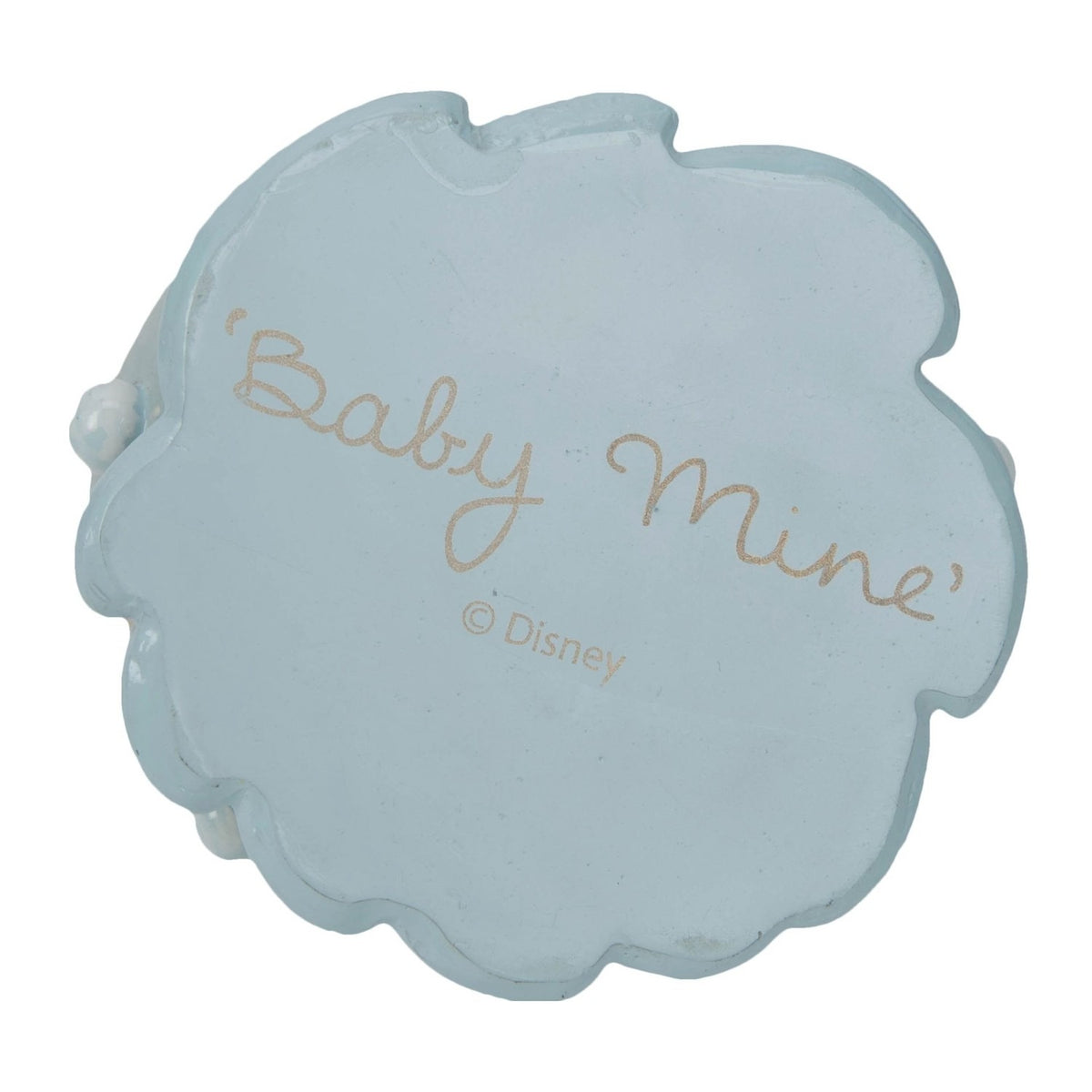 Base of the Dumbo in Bubble Bath resin figurine in pale blue with a scalloped edge, engraved 'Baby Mine' script and Disney copyright mark, shown on a white background.