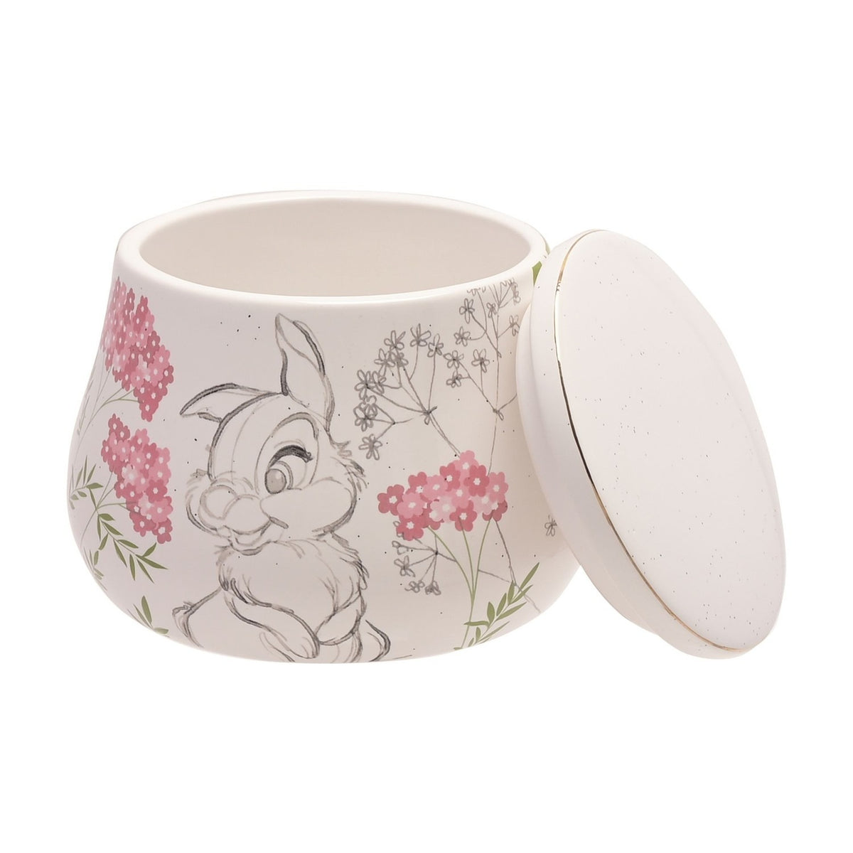 Round white ceramic trinket box with lid, featuring a pencil-sketch Thumper rabbit design amid pink flowers and green leaves, lid resting beside the open pot on a plain background.