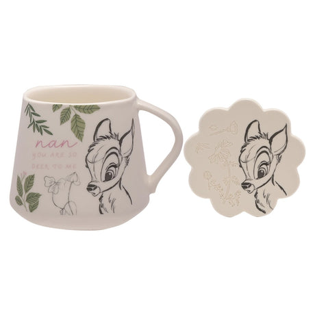 White gloss Bambi mug with scalloped coaster, featuring sketched Bambi, leaves and "Nan, you are so deer to me" text in pink script, on a plain white background.