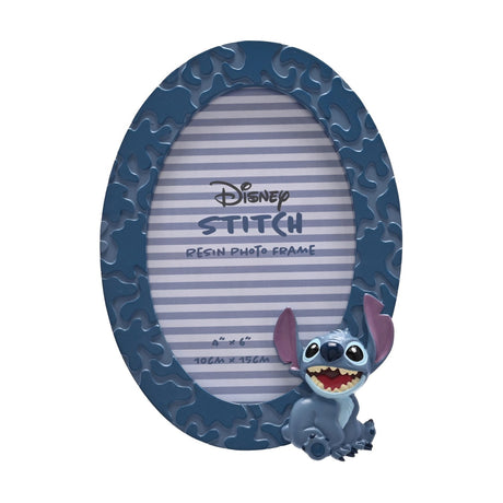 Blue oval resin photo frame for a 6 x 4in photo, textured matt border with a three-dimensional Stitch figure perched at the lower right, shown on a plain white background.