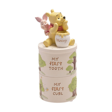 Round white resin keepsake box set with stacked "My First Tooth" and "My First Curl" tiers, topped by a sculpted Winnie the Pooh and Piglet lid, shown on a plain white background.