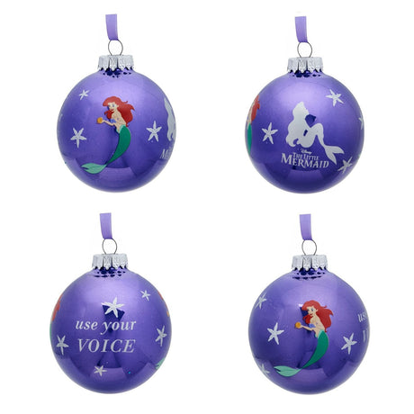 Four round purple glass baubles from the Little Mermaid set, printed with Ariel, her silhouette, starfish motifs and "use your VOICE" text on a white background.