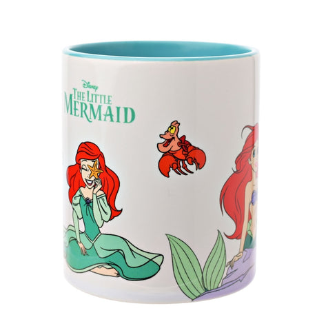 White stoneware mug with teal handle and interior, featuring Ariel from The Little Mermaid in red hair and green gown, holding a starfish, with Sebastian the crab, on plain background.