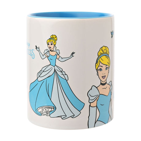 White stoneware mug with blue interior, featuring Cinderella in a light blue ball gown illustrated in multiple poses, shown on a plain white background.