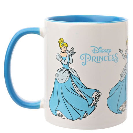White stoneware mug with blue handle and interior, featuring Cinderella in a blue gown in multiple poses with "Disney Princess" text, shown on a plain white background.